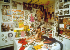 Liz Hall srounded by Sex Pistols memorabilia (circa 1979) © Phil Strongman