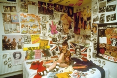 Liz Hall srounded by Sex Pistols memorabilia (circa 1979) © Phil Strongman